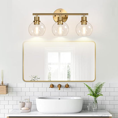 Indoi 3-Light Bathroom Light Fixtures, Brushed Gold Modern Vanity Lights Over Mirror with Clear Glass Globe Shade, Bathroom Wall Sconces for Mirror Kitchen Living Room Hallway Cabinet Bedroom Porch